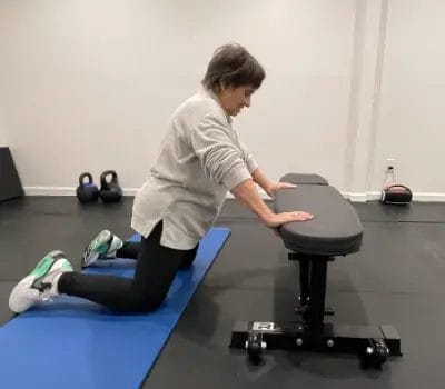 Client performing a knee support strength exercise at FIT40 Personal Training studio